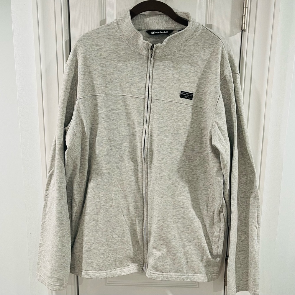 Travis Mathew full zip golf sweatshirt.